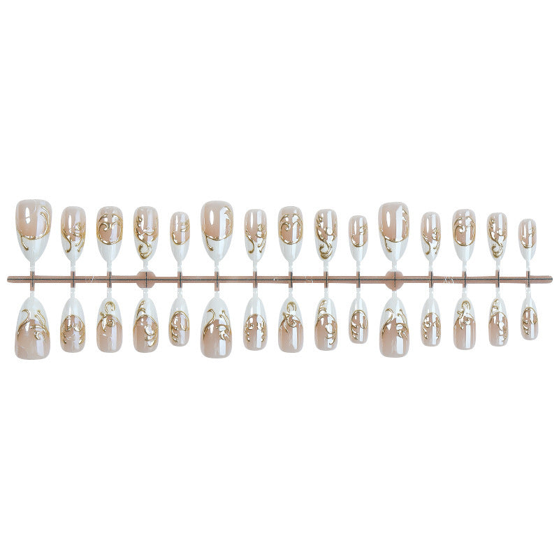 Nail art set with elegant golden applications Bowlift