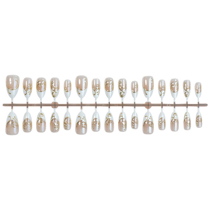 Nail art set with elegant golden applications Bowlift