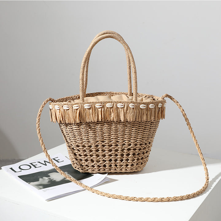 Braided straw bag with decorative tassel detail Bowlift