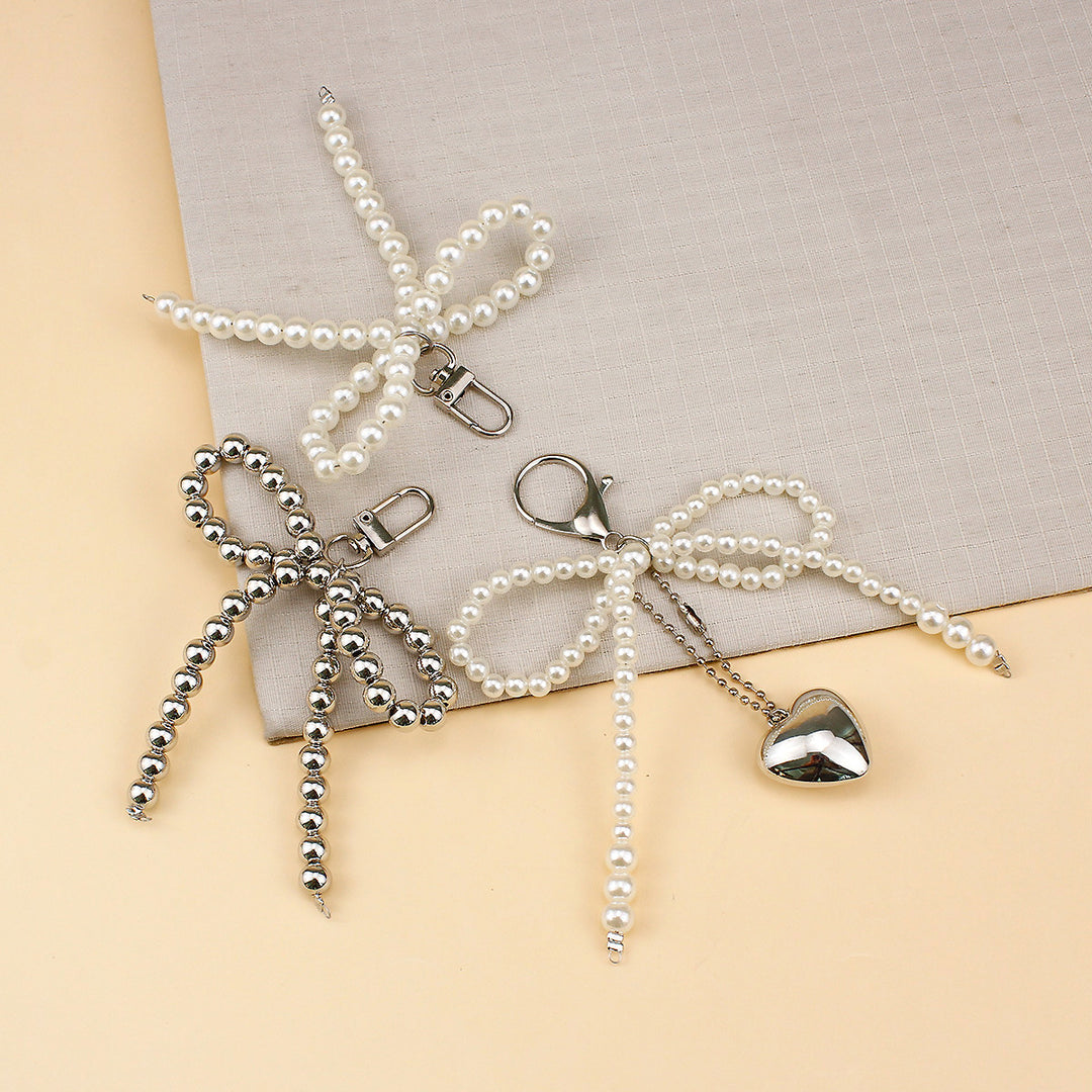 Elegant Pearl Bow Brooch Bowlift