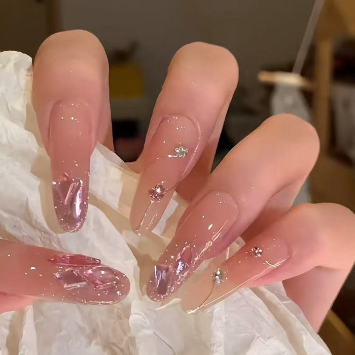 Artistic Nail Extensions with Glitter Accents Bowlift
