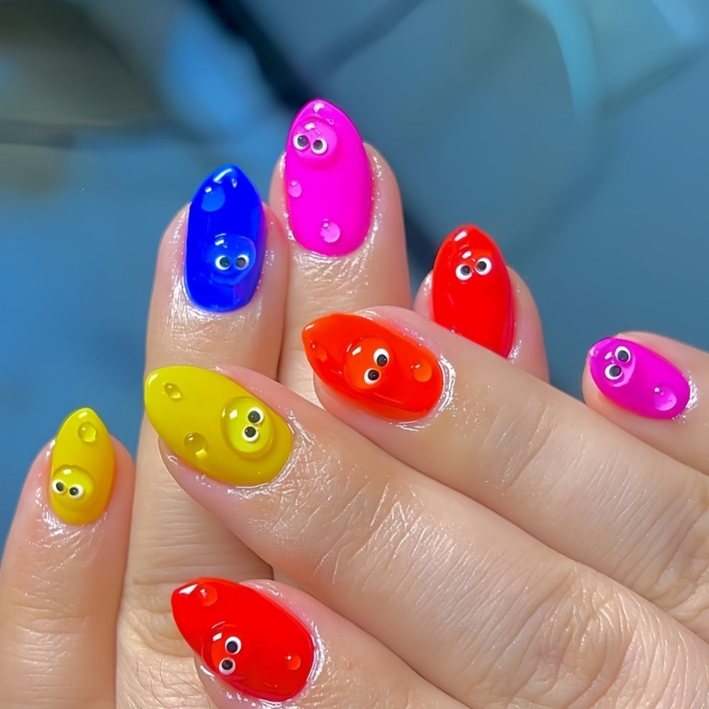 Creative artificial nails with funny faces and colorful accents Bowlift