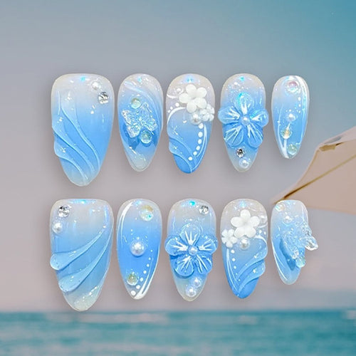 Creative nail set with floral accents and glittering details Bowlift