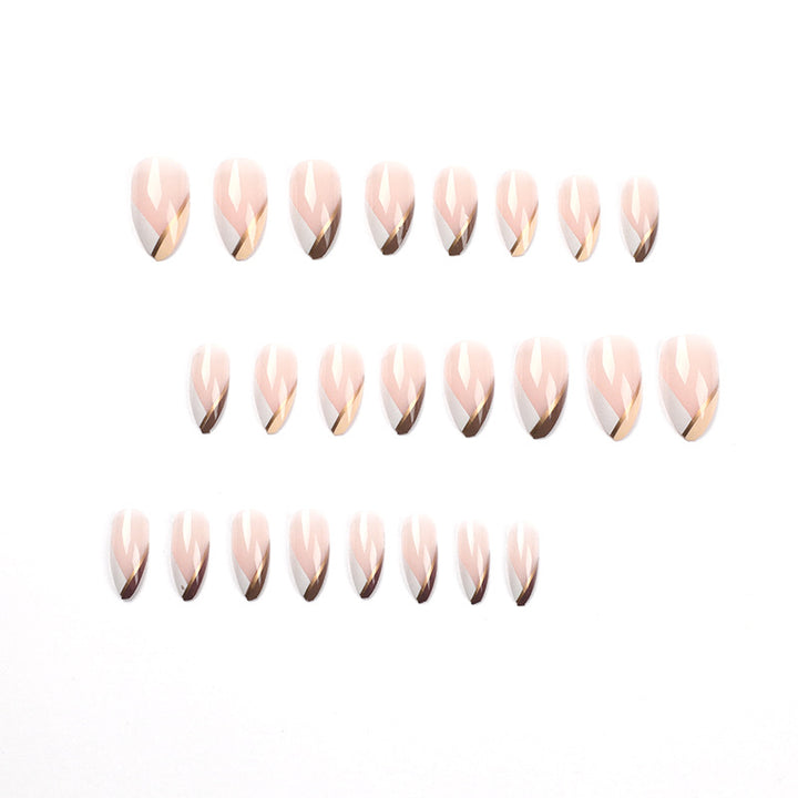 Artful nail art in elegant stiletto design with golden accents Bowlift