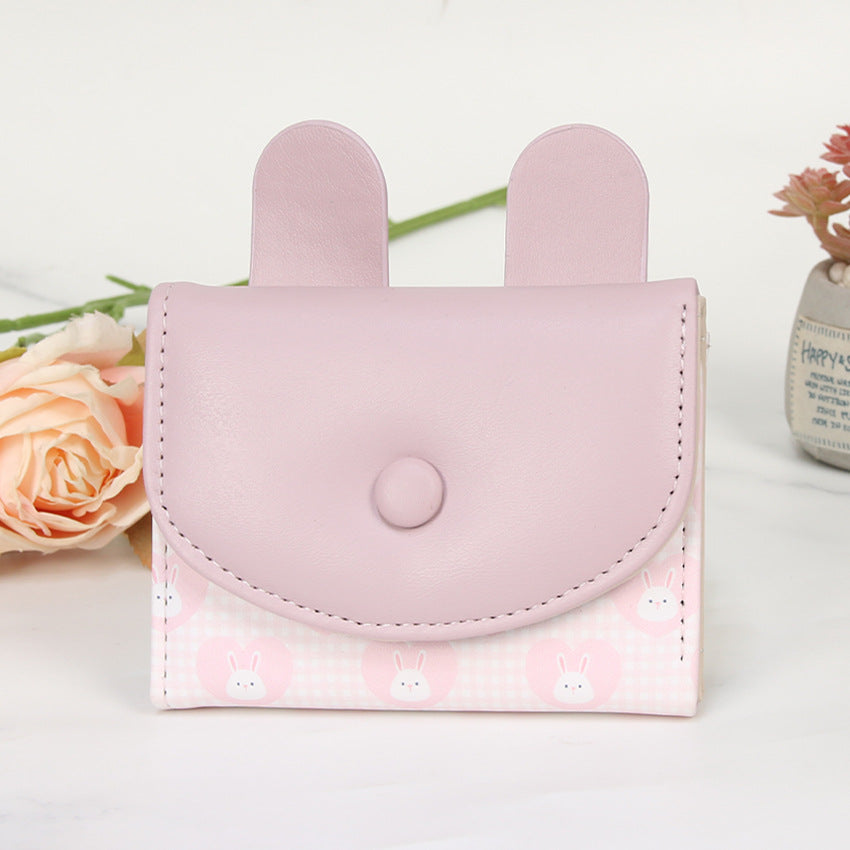 Compact rabbit-themed coin purse with snap closure and card slots Bowlift