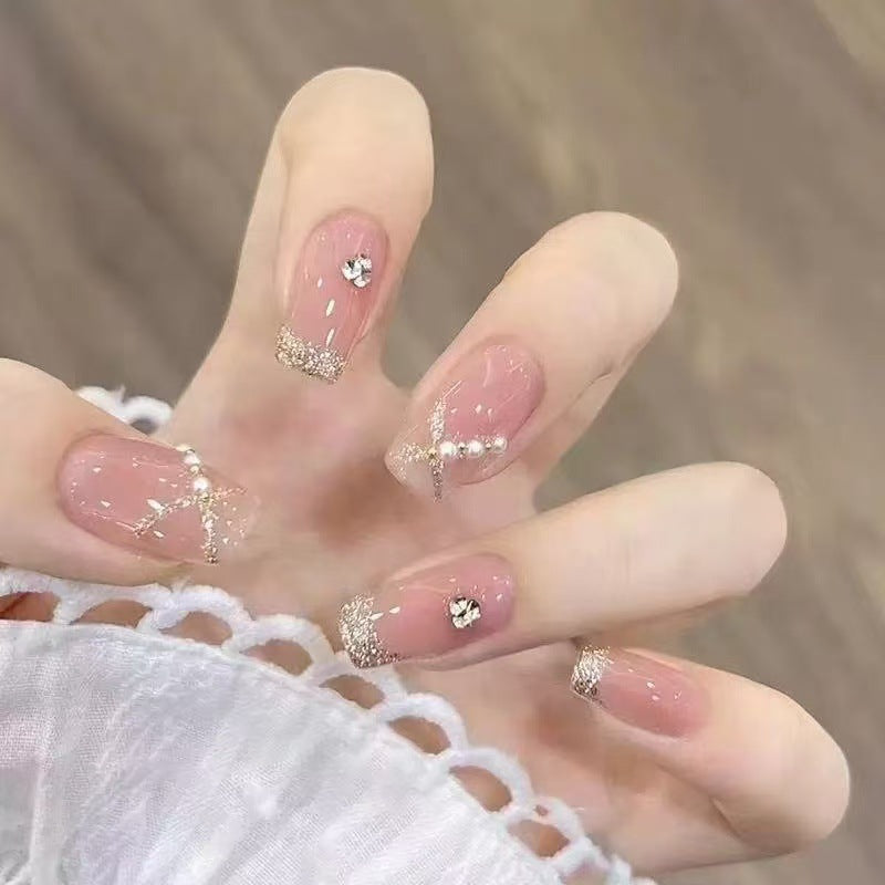 Glamorous artificial nails with rhinestone details Bowlift