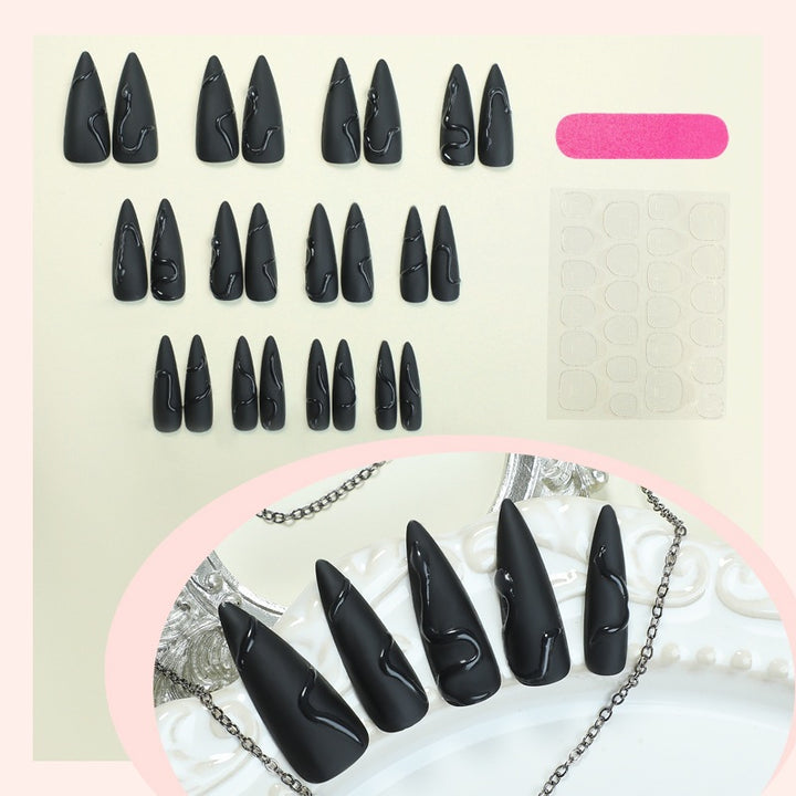 Elegant artificial nails with shimmering decorations and creative designs Bowlift