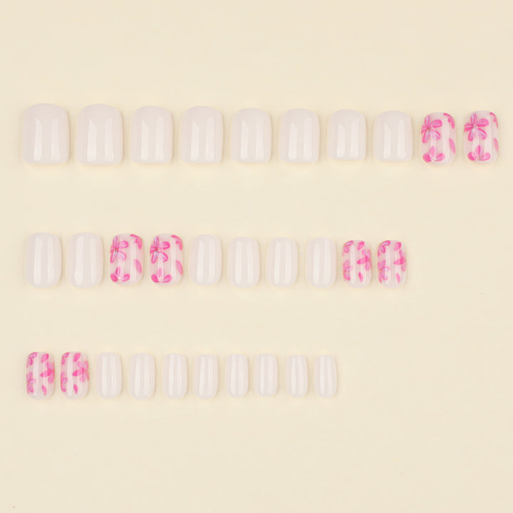 Stylish artificial nail design with floral accents Bowlift