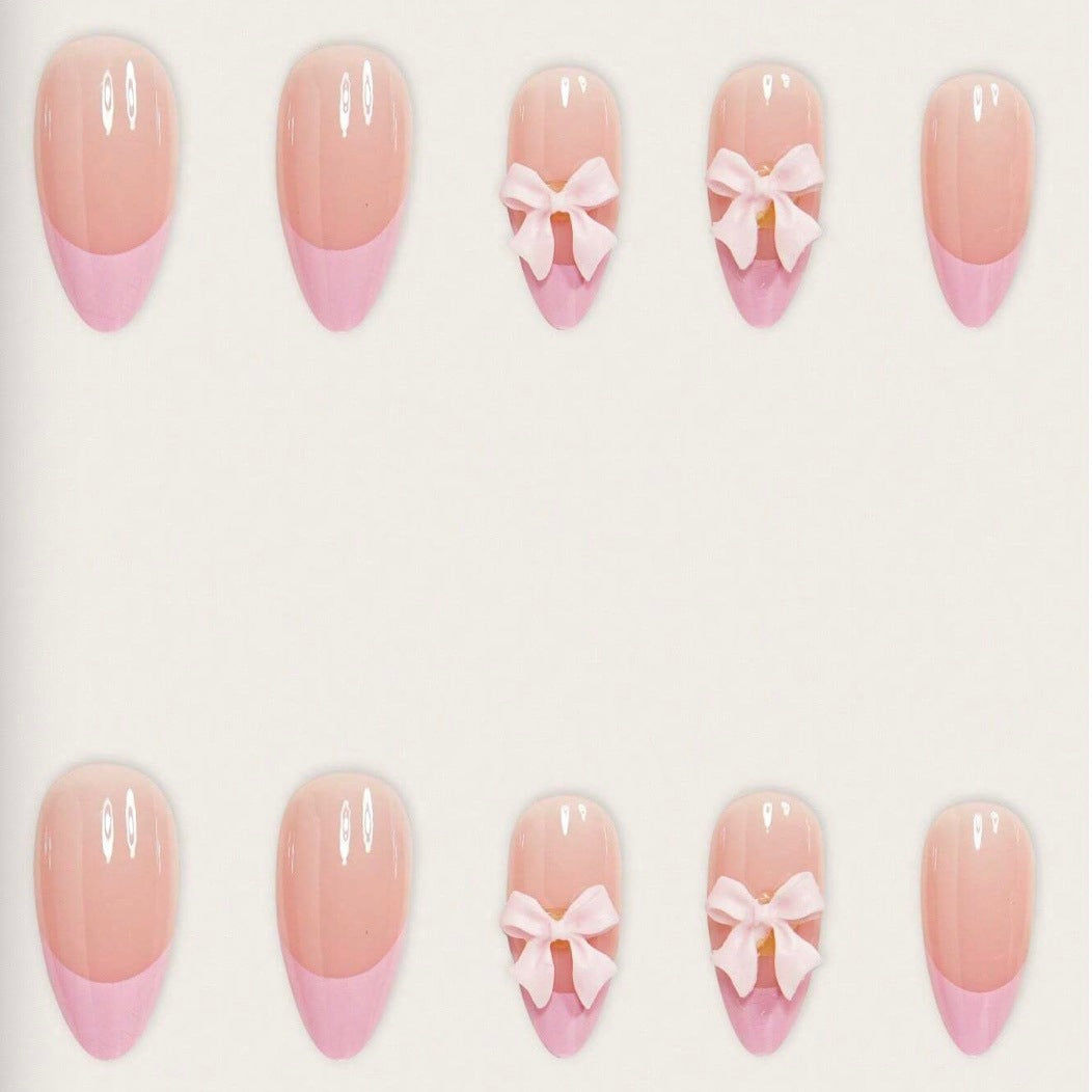 Nail art set with playful ribbons and shiny decorations Bowlift