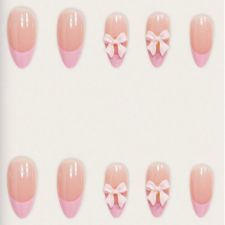 Nail art set with playful ribbons and shiny decorations Bowlift