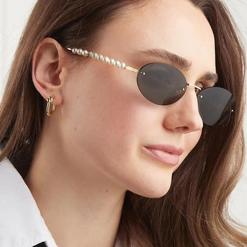 Women's stylish oval sunglasses with elegant embellishments Bowlift