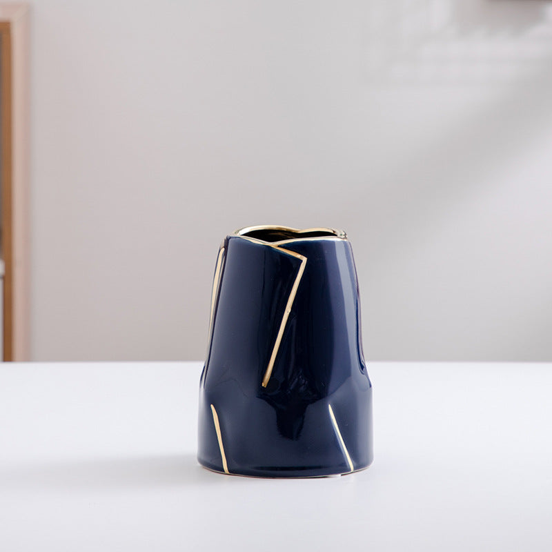 Decorative ceramic vase with golden accents Bowlift