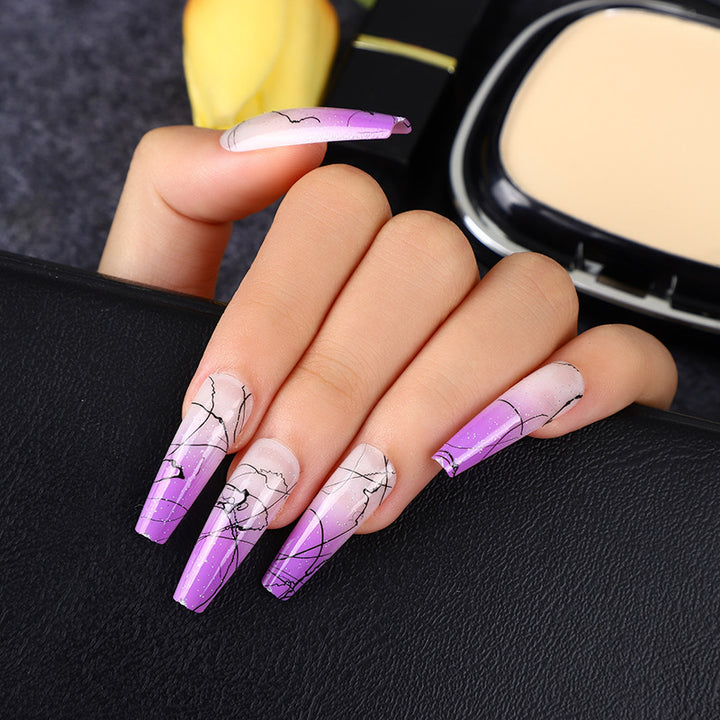 Artificial nails in modern ombre design with marbled accents Bowlift