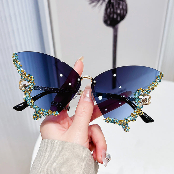 Women's extravagant sunglasses with sparkling butterfly design Bowlift