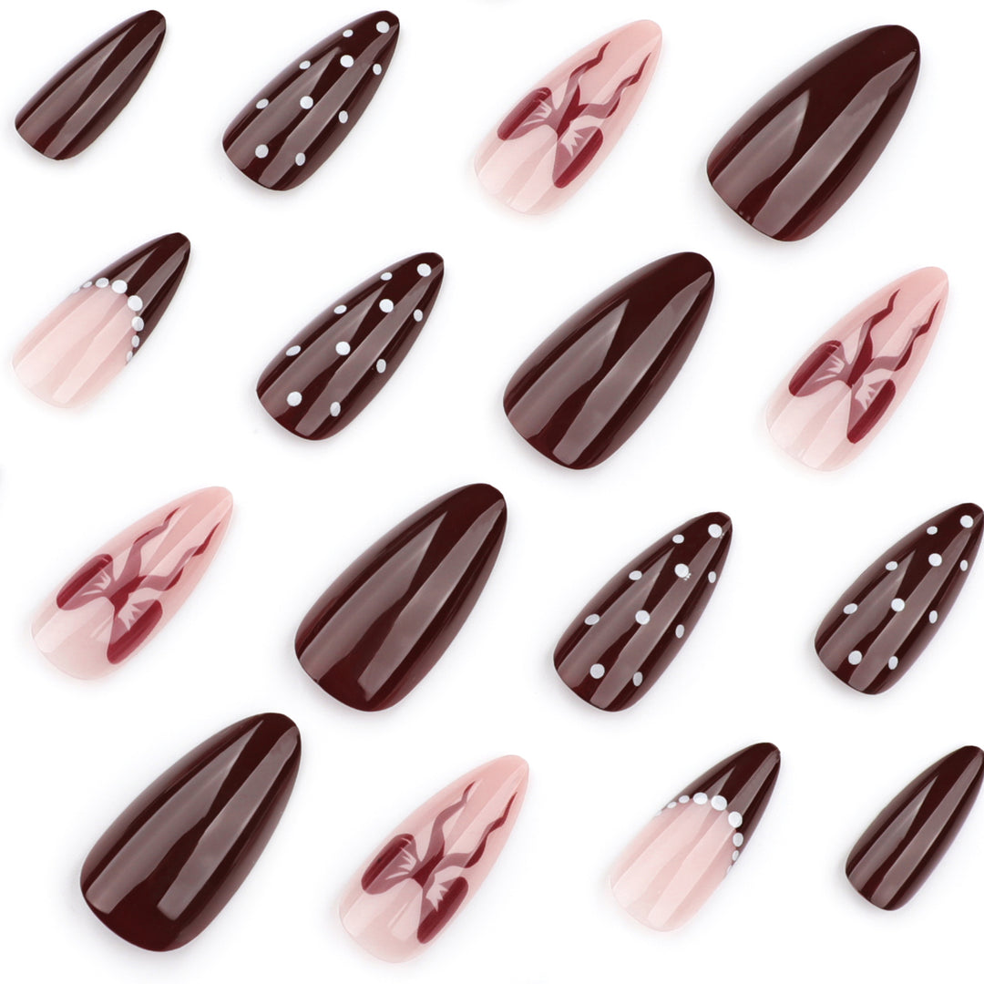 Elegantly designed stiletto nails with artistic accents Bowlift