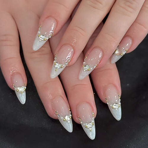 Acrylic nail set with elegant rhinestone decorations and glamorous designs Bowlift