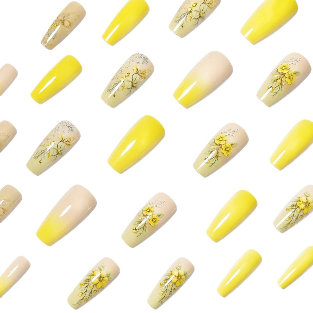 Artificial nails with floral embellishments and glitter Bowlift