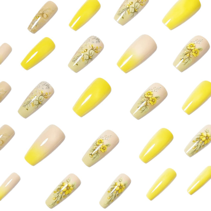 Artificial nails with floral embellishments and glitter Bowlift