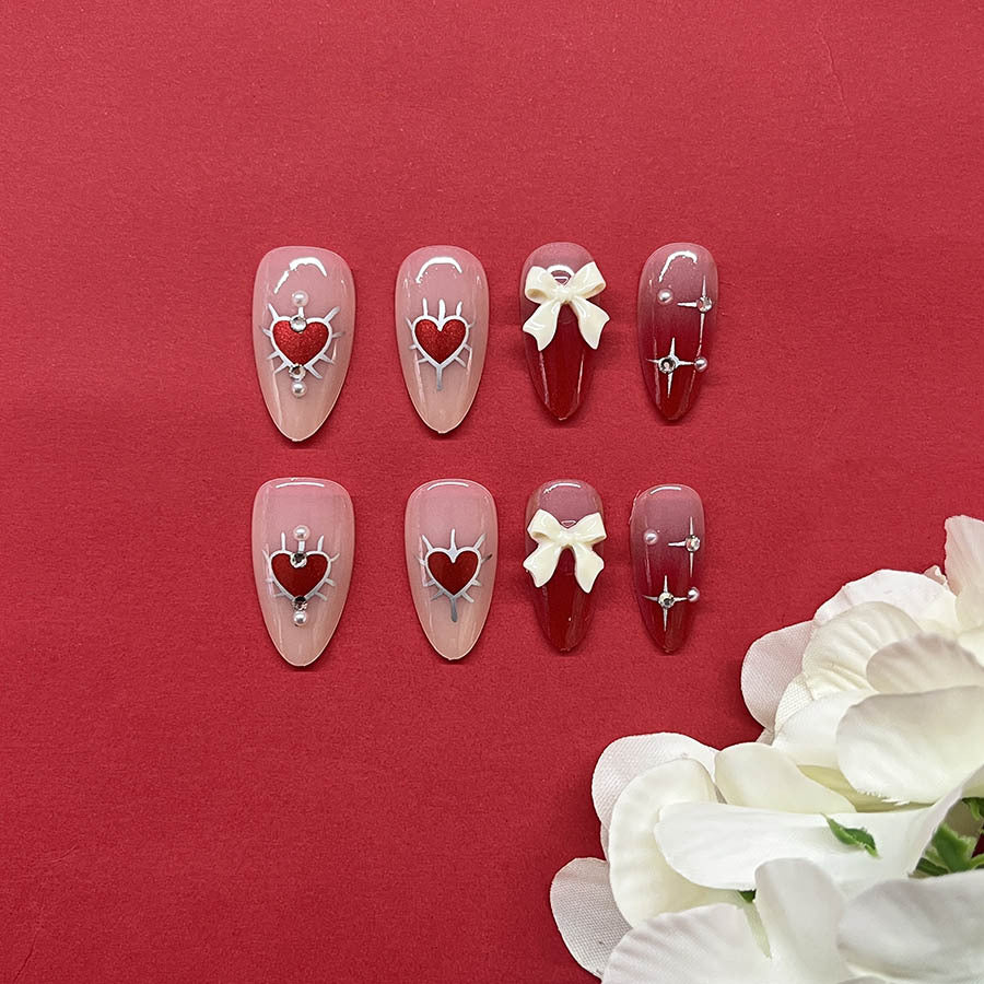 Artistic Heart-Themed Nail Art Extensions Bowlift