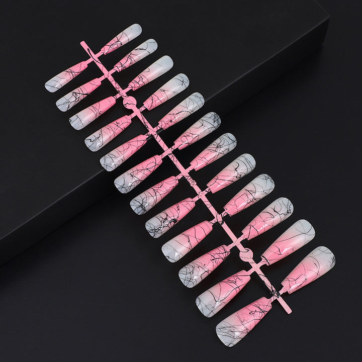 Artificial nails in modern ombre design with marbled accents Bowlift