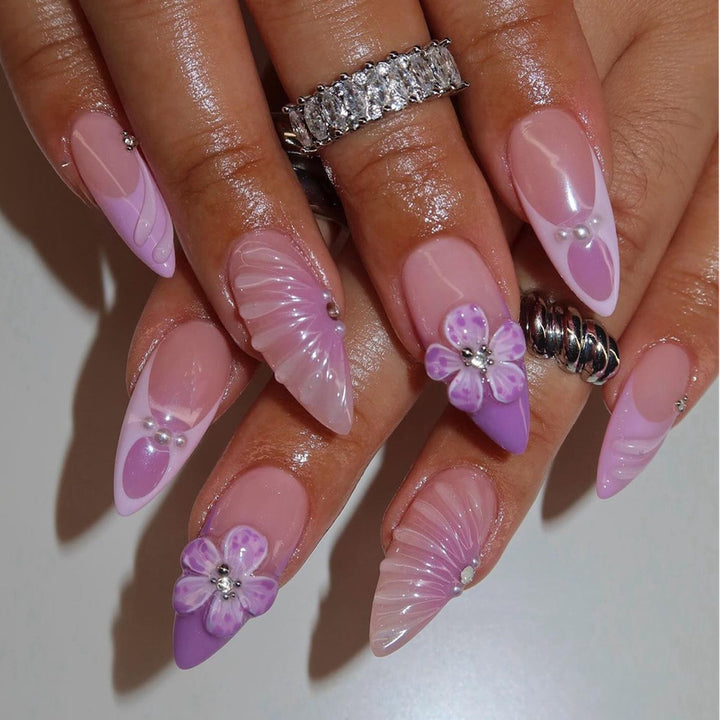 Artistic Stiletto Press-On Nail Art with Floral and Gemstone Accents Bowlift