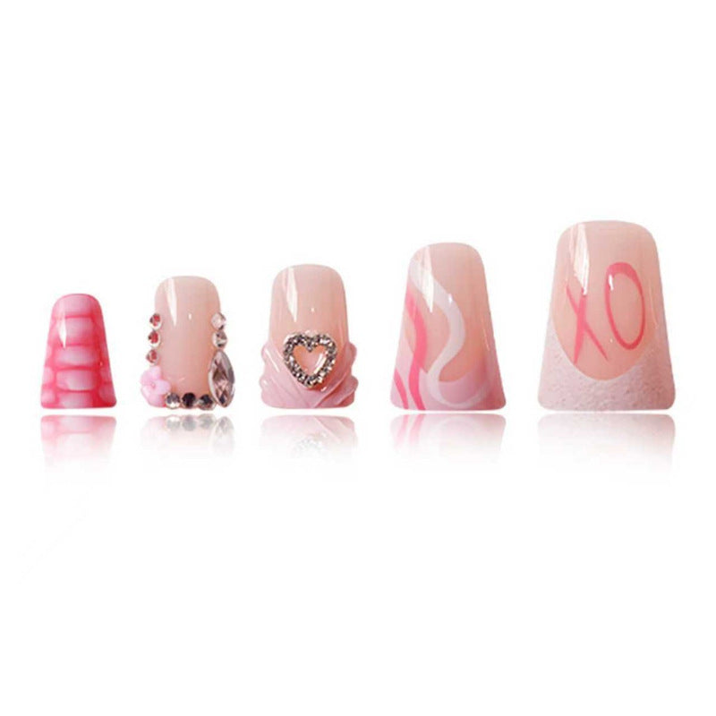 Decorative Press-On Nail Design with Heart and Gem Accents Bowlift
