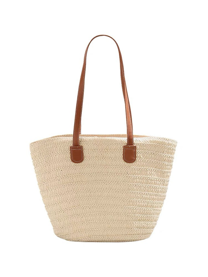 Stylish beach bag made of woven natural material with leather handles Bowlift