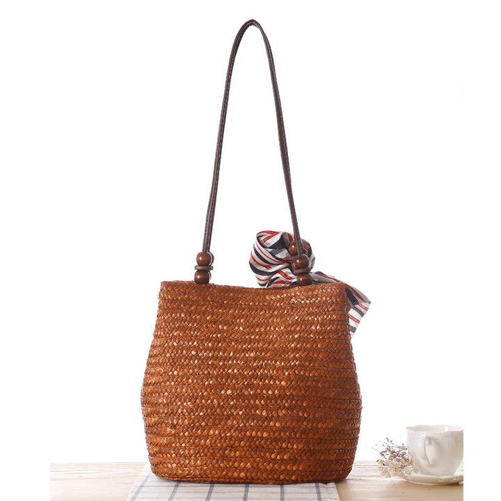 Elegant basket bag with trendy ribbon detail Bowlift