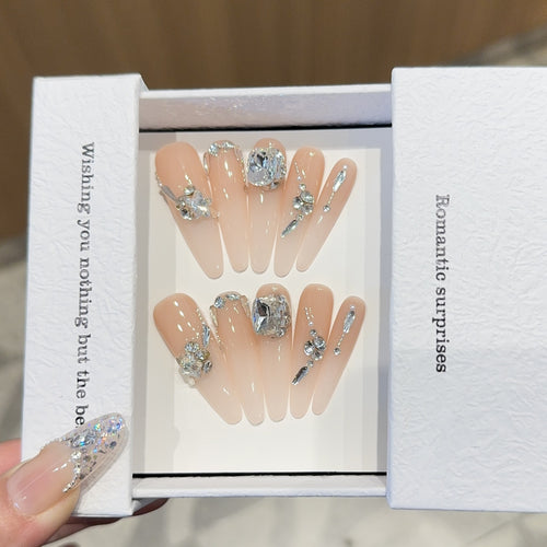 Artificial nails with exclusive rhinestone embellishments Bowlift