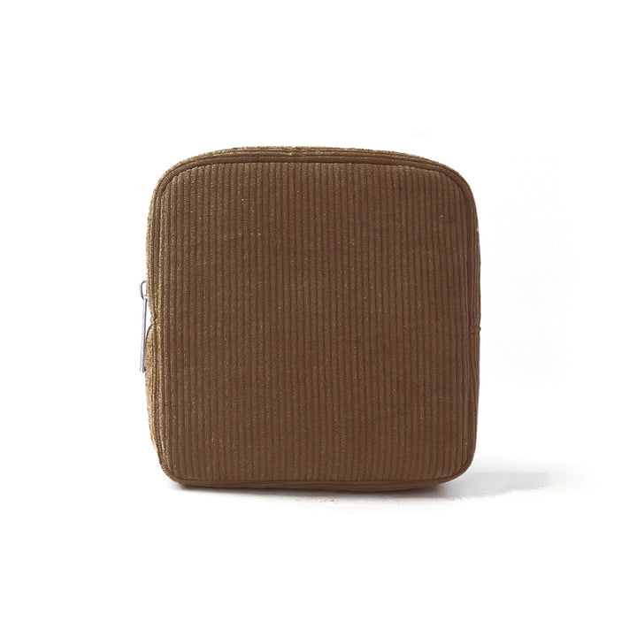Cosmetic storage bag with structured surface Bowlift