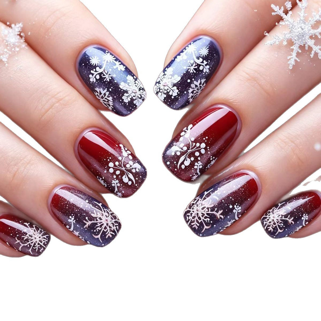 Artificial nails with festive glitter effect and wintry snow motif Bowlift