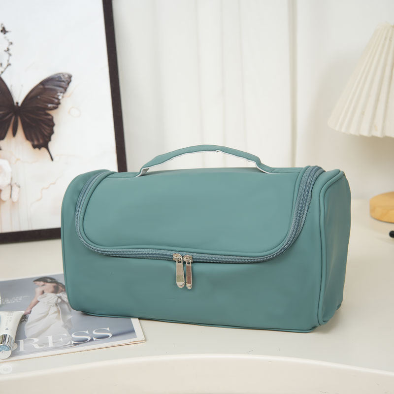 Travel cosmetics bag with multiple compartments Bowlift
