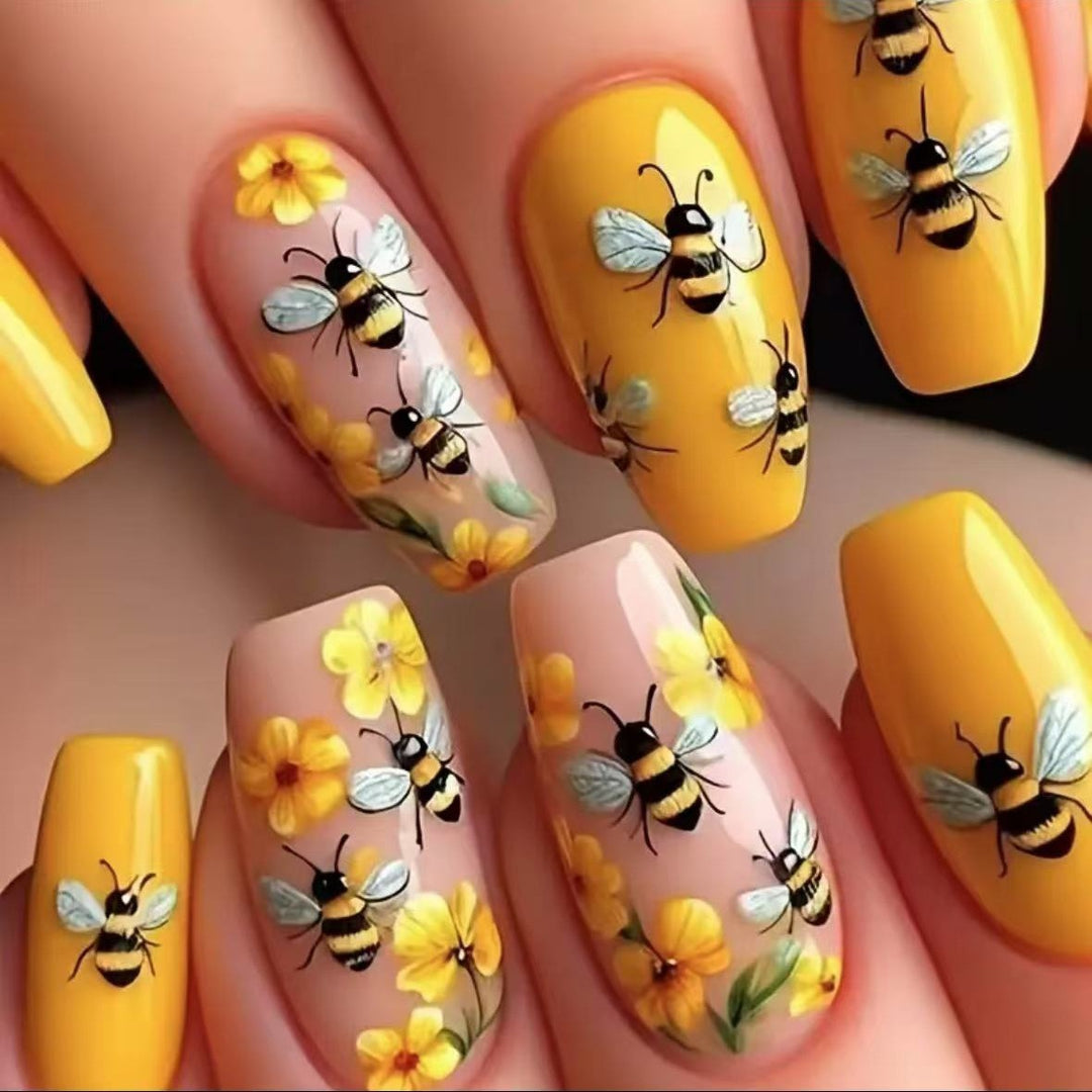 Nail art set with creative bee and flower designs Bowlift