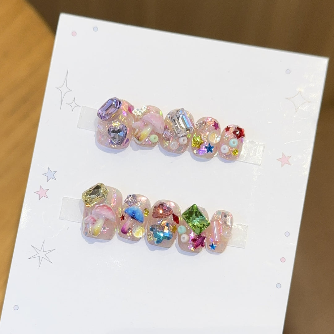 Artificial nails with sparkling crystal accents Bowlift