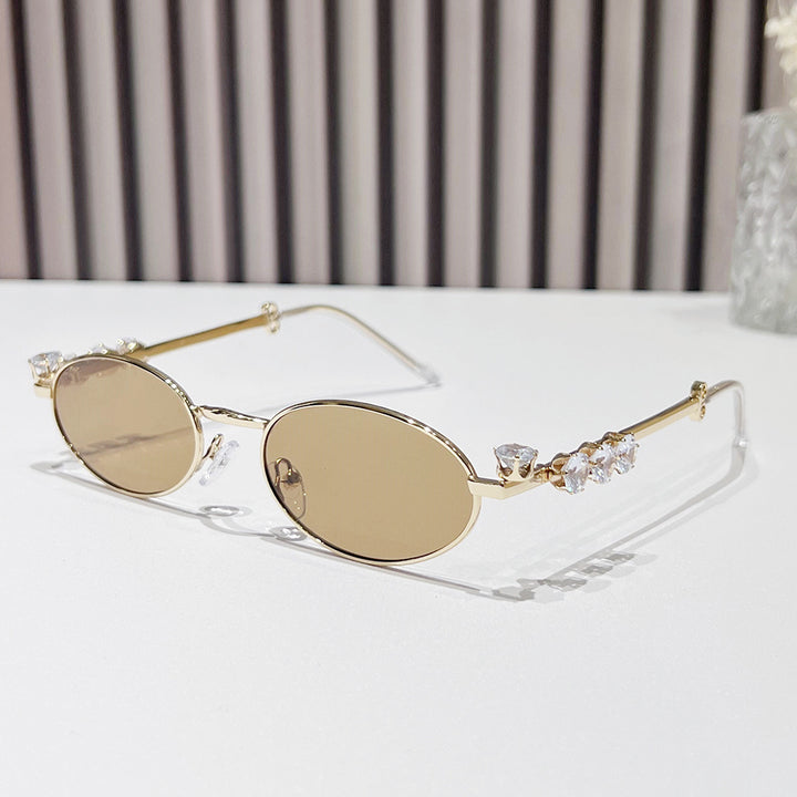 Fashion-Forward Oval Sunglasses with Crystal Accents Bowlift