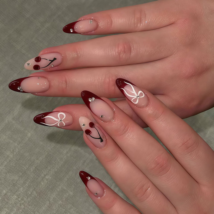 Artistic Stiletto Press-On Nail Set with Cherry and Bow Designs Bowlift