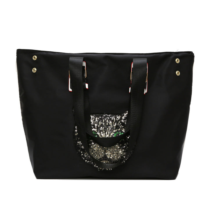 Stylish shoulder bag with unique cat motif Bowlift
