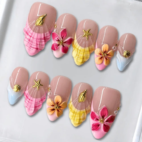 Artificial nail set with floral patterns and sparkling accents Bowlift