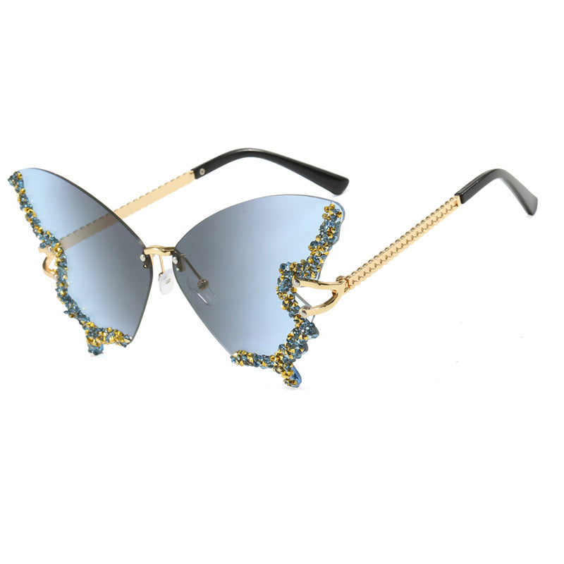 Women's large cat-eye sunglasses with sparkling rhinestone embellishment and elegant frame Bowlift