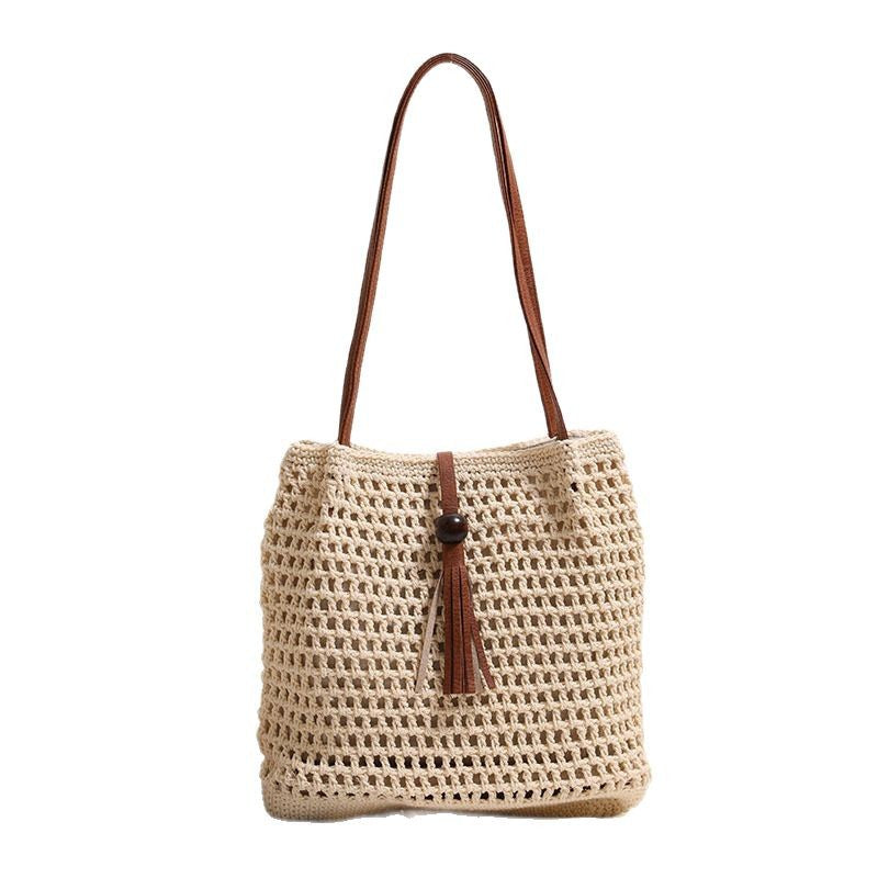 Hand-knotted basket bag with elegant leather handles Bowlift