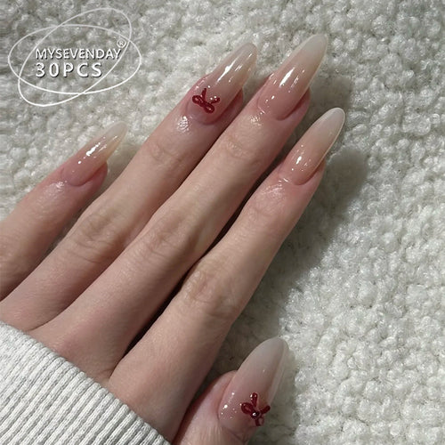Elegant Stiletto Press-On Nails with Decorative Bow Accents Bowlift