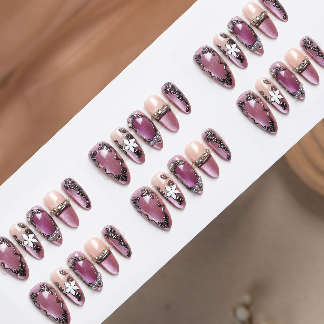 Acrylic nail set with floral design and glamorous accents Bowlift