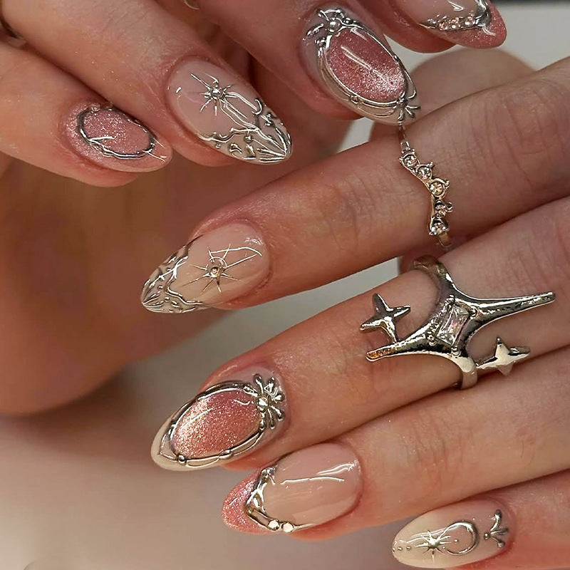 Artificial nail set with glamorous floral and metallic accents Bowlift