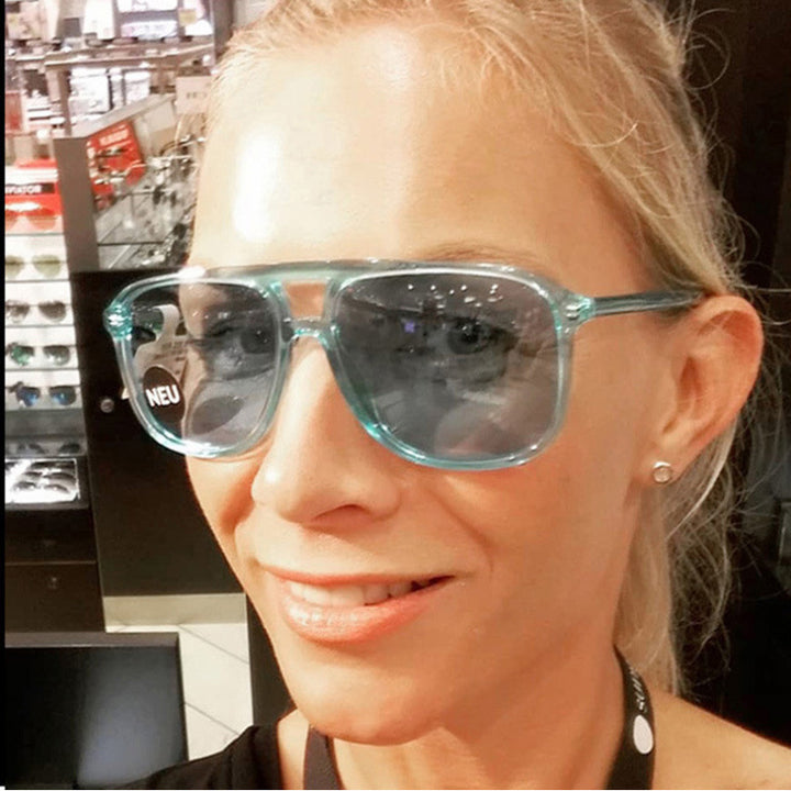 Women's fashionable sunglasses in transparent design with colored lenses Bowlift