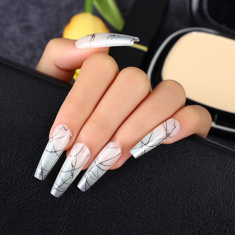 Artificial nails in modern ombre design with marbled accents Bowlift