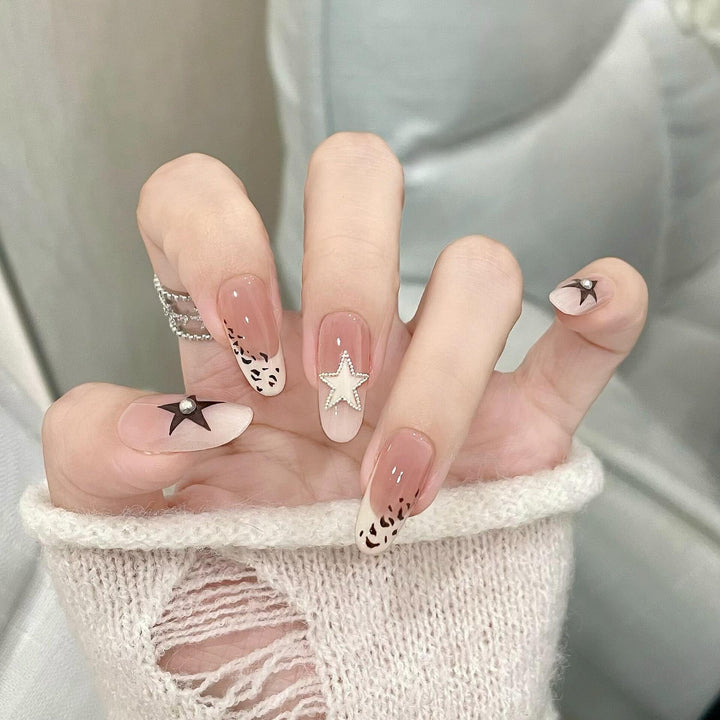 Artificial Nail Design with Festive Star Motif Bowlift