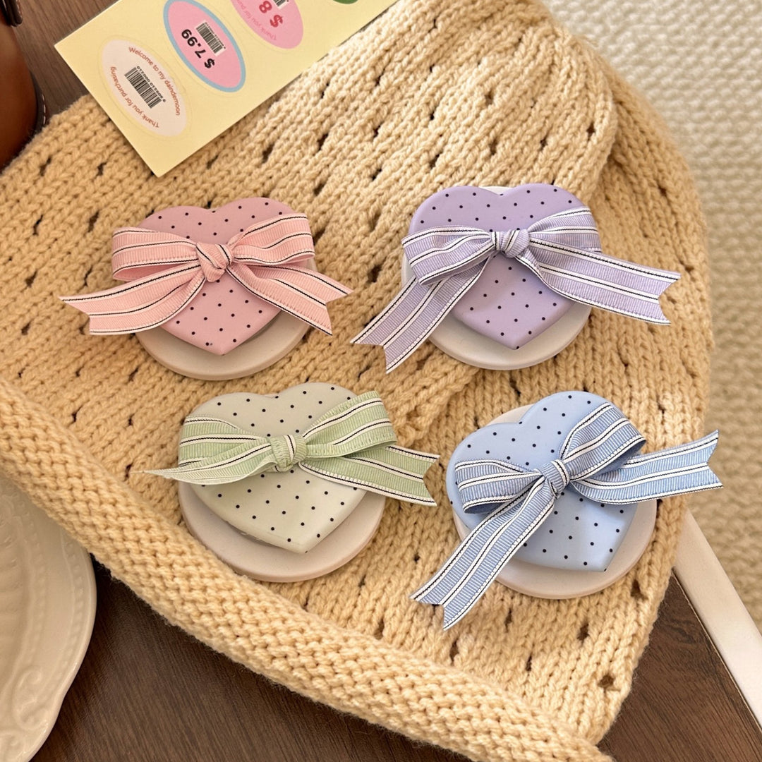 Heart-shaped cosmetic box with bow motif Bowlift