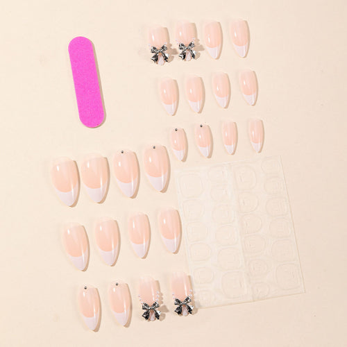 Elegant Stiletto Nail Art with Rhinestone Accents Bowlift