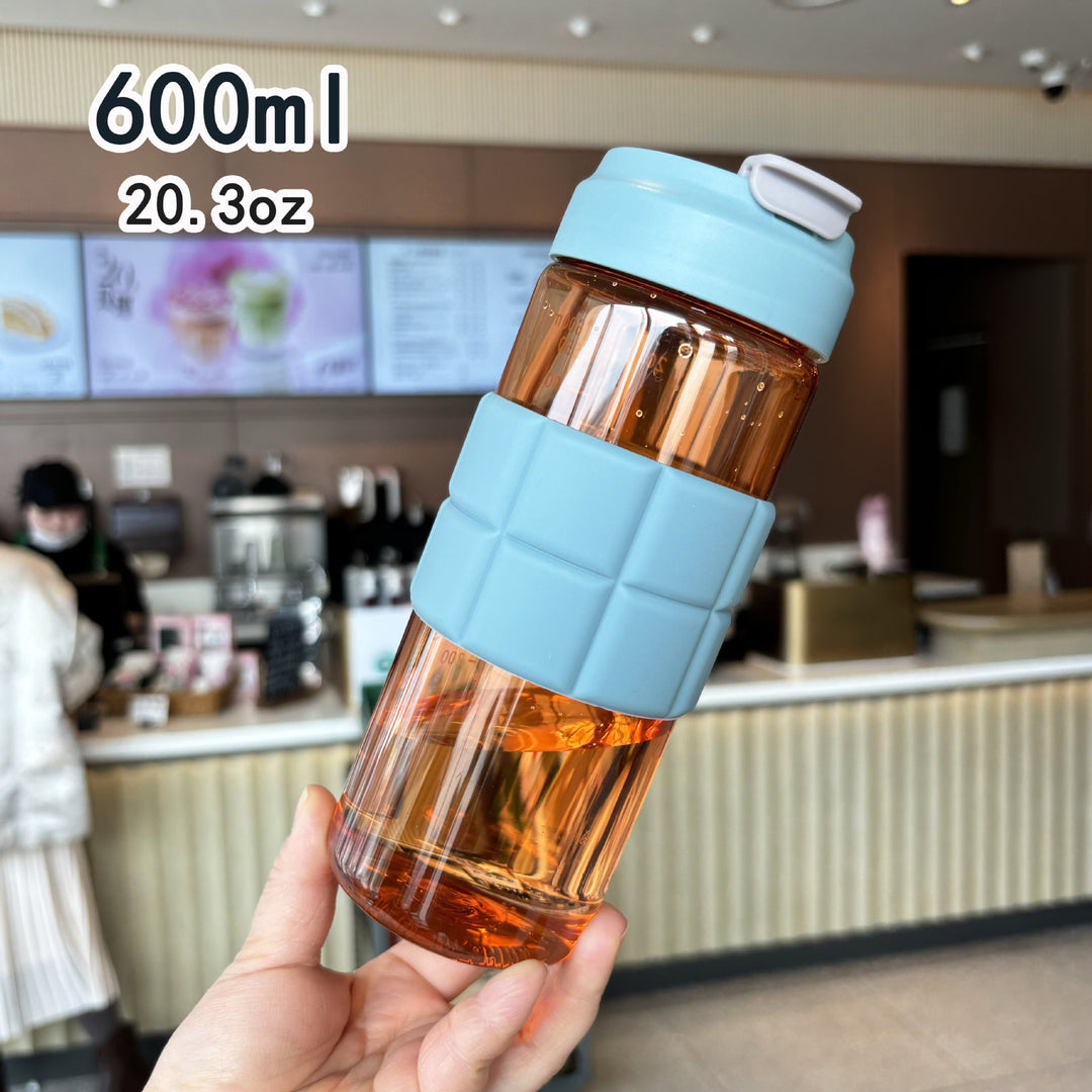 Women's transparent drinking bottle with non-slip silicone coating Bowlift