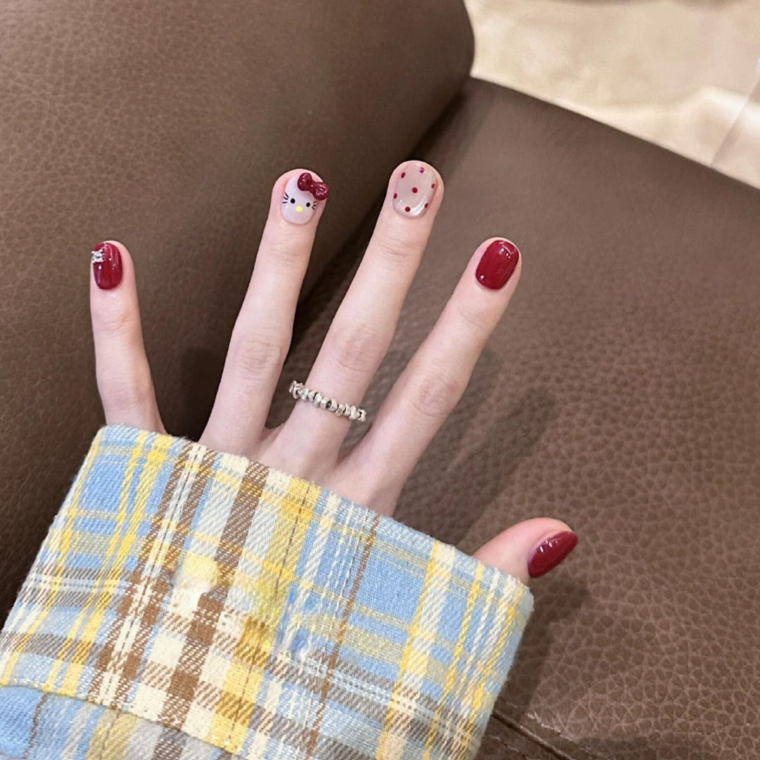 Artificial nail set with playful designs Bowlift